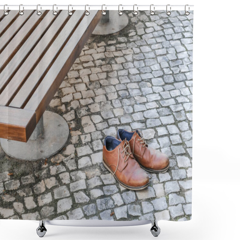 Personality  Brown Leather Shoes On A Cobblestone Pavement Next To A Bench In An Urban Setting. Shower Curtains