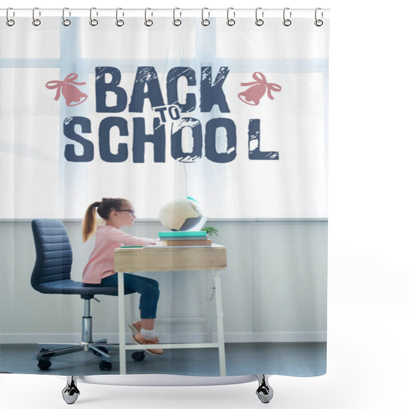 Personality  Side View Of Little Schoolgirl Studying With Books And Laptop At Home With 