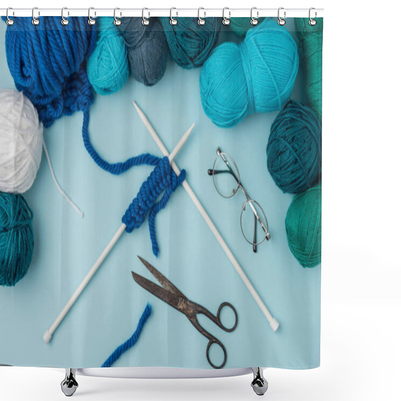 Personality  Close Up View Of Yarn, Knitting Needles, Eyeglasses And Scissors On Blue Backdrop Shower Curtains