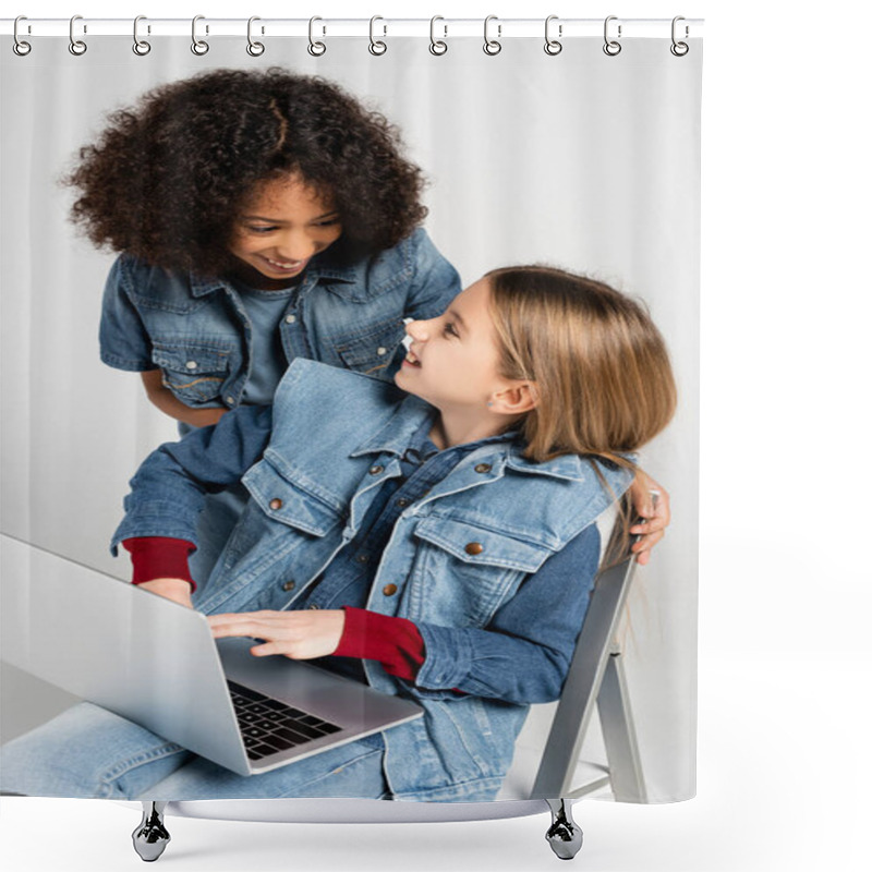 Personality  Cheerful African American Girl In Denim Clothes Near Happy Friend Sitting On Chair With Laptop Isolated On Grey Shower Curtains