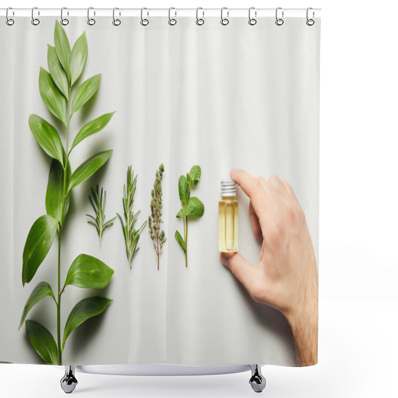 Personality  Cropped View Of Man Holding Bottle Of Essential Oil On White Background Shower Curtains