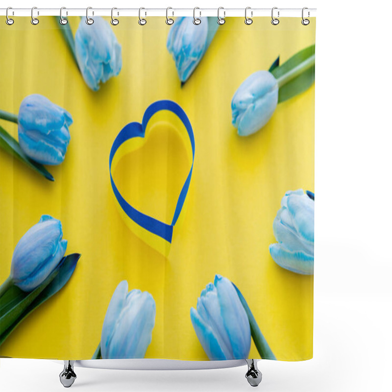 Personality  Top View Of Blue And Yellow Ribbon In Heart Symbol In Frame Of Tulips On Background  Shower Curtains