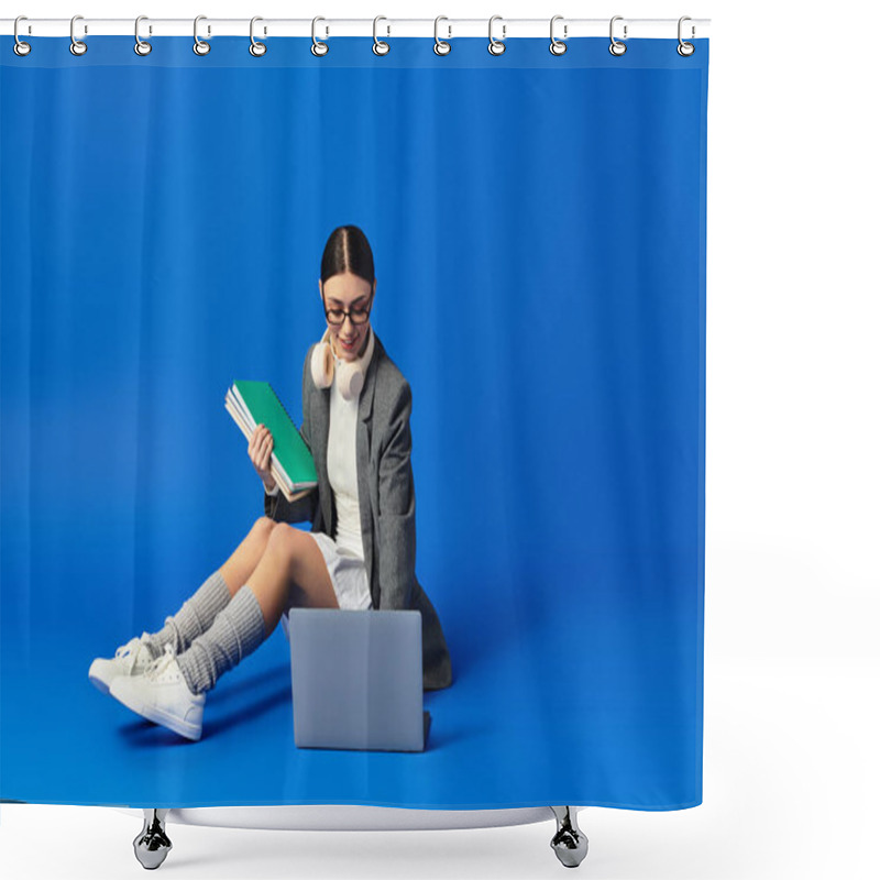 Personality  A Young Woman With A Joyful Expression Is Engaged With Her Laptop While Holding Books. Shower Curtains