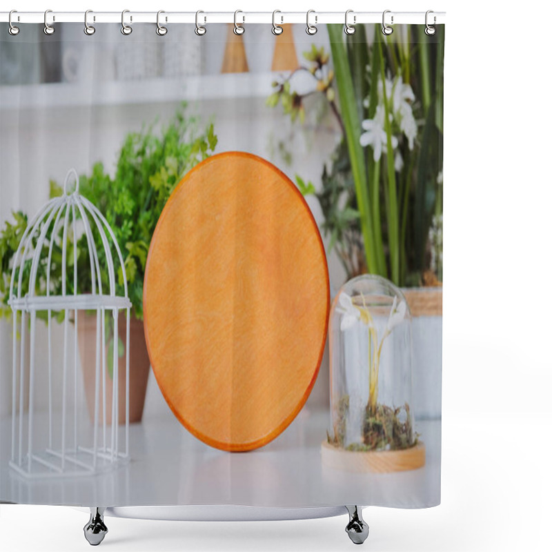 Personality  A Wooden Plate Sits Near A Glass Terrarium And A White Birdcage On A Table. Shower Curtains