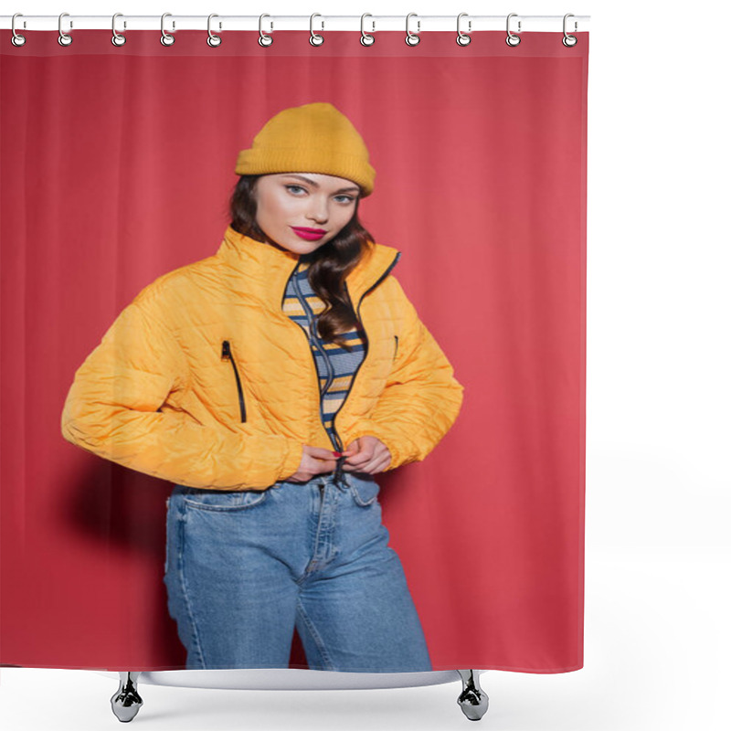 Personality  Young Woman In Beanie Hat Zipping Orange Puffer Jacket And Looking At Camera On Red Shower Curtains