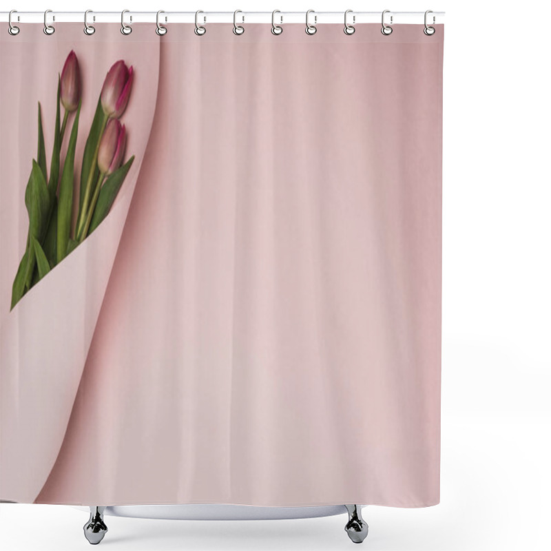 Personality  Top View Of Purple Tulips Wrapped In Paper Swirl On Pink Background Shower Curtains