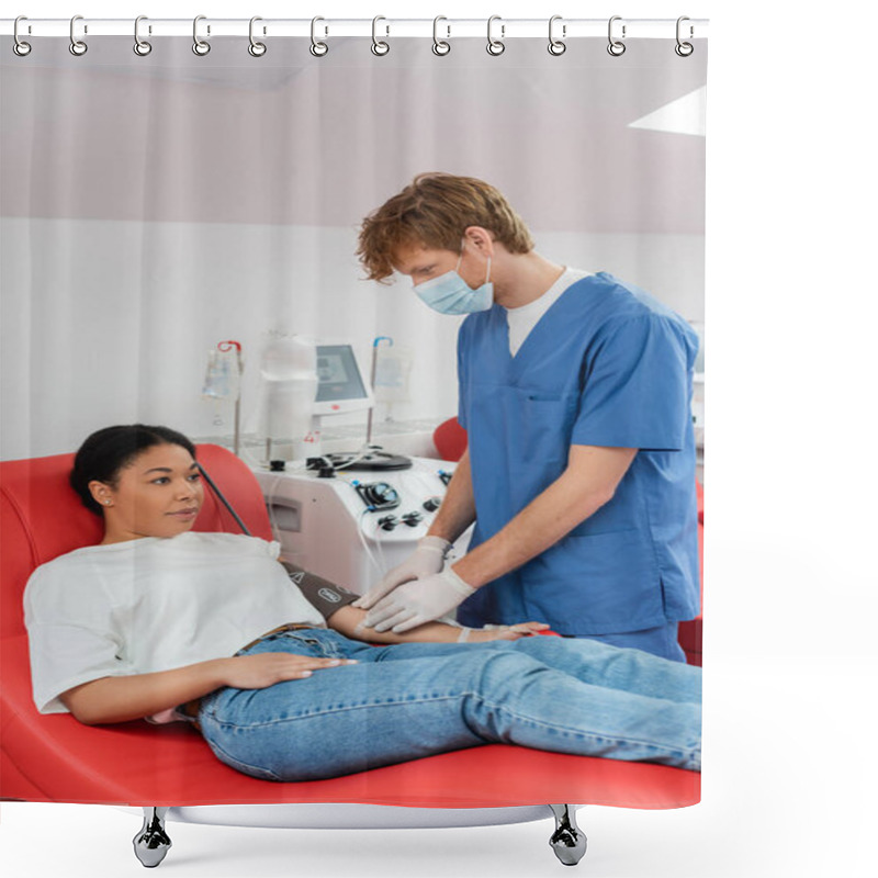 Personality  Redhead Doctor In Medical Mask, Blue Uniform And Latex Gloves Holding Alcohol Pad And Wiping Arm Of Multiracial Woman Sitting On Medical Chair In Blood Donation Center Shower Curtains