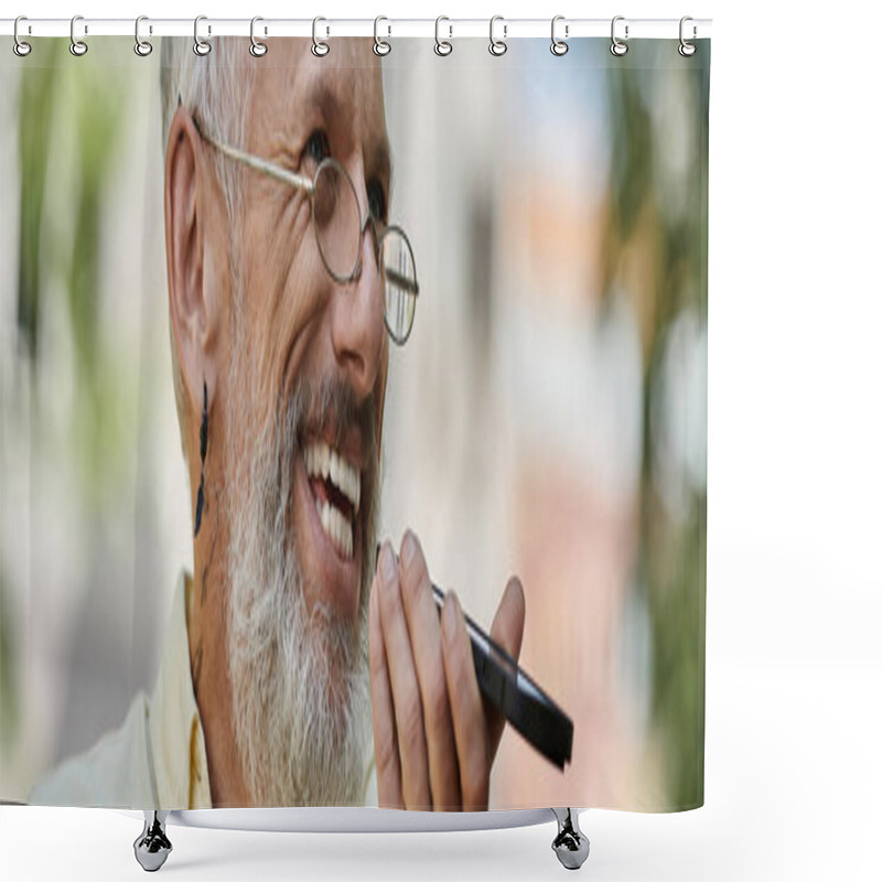 Personality  A Mature Man With A Beard And Glasses Smiles While Using His Phone Outside A Modern Building. Shower Curtains