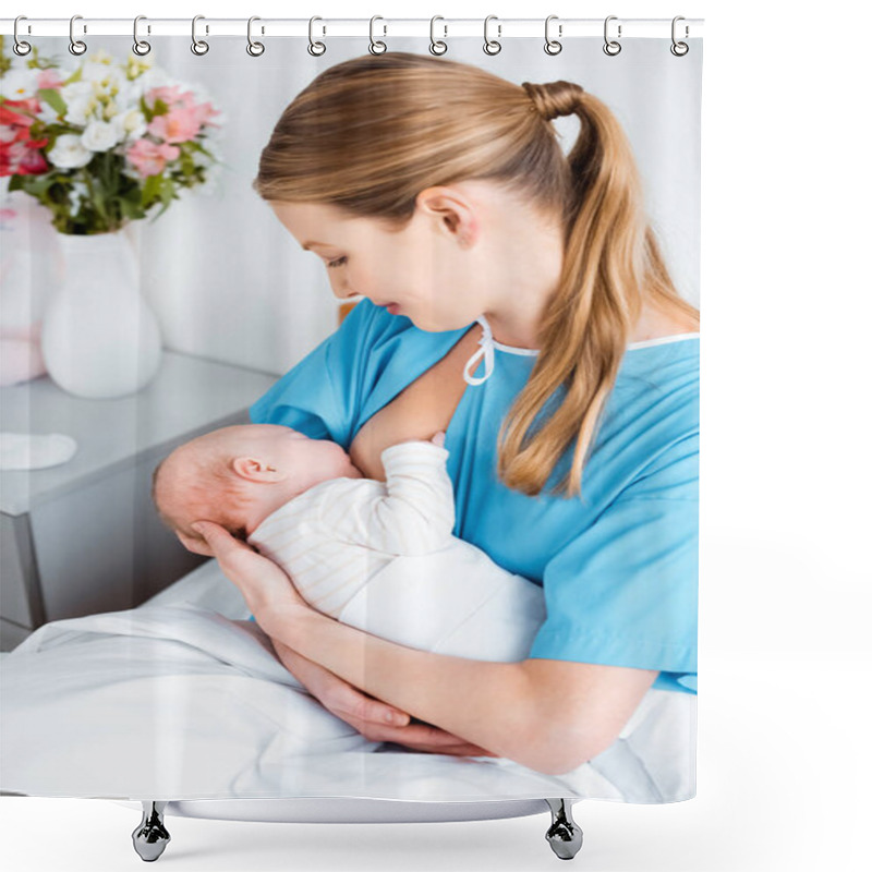 Personality  High Angle View Of Smiling Young Mother Sitting On Bed And Breastfeeding Baby In Hospital Room Shower Curtains