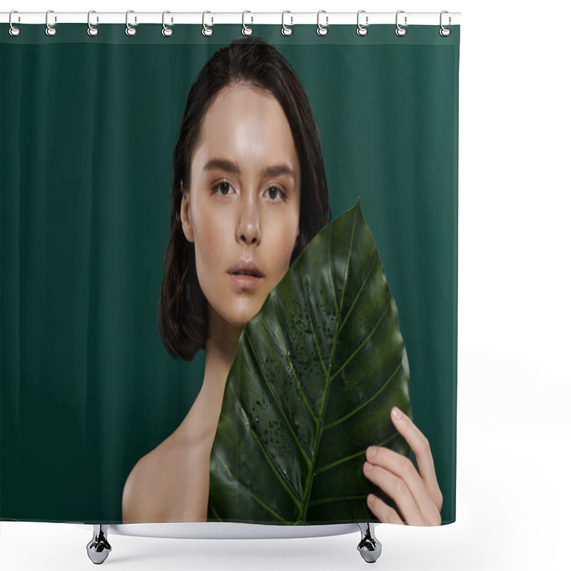 Personality  A Woman Poses Against A Green Background, Holding A Large Green Leaf. Shower Curtains