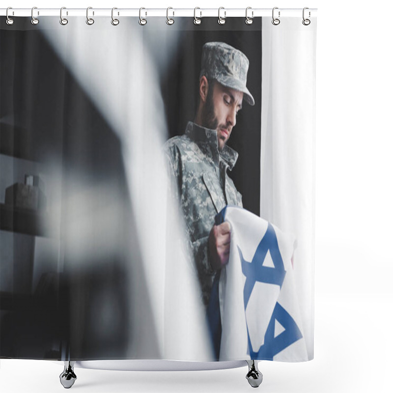 Personality  Selective Focus Of Pensive Bearded Man In Military Uniform Holding Israel National Flag While Standing By Window Shower Curtains