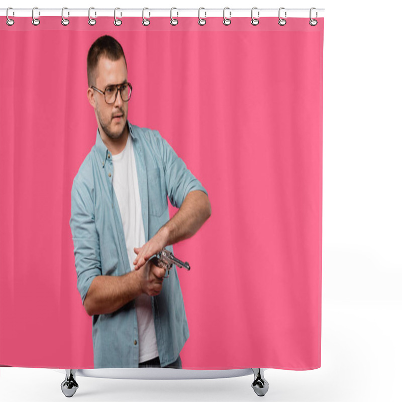 Personality  Young Man In Eyeglasses Reloading Revolver And Looking Away Isolated On Pink Shower Curtains