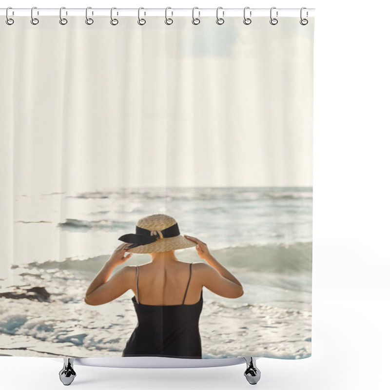 Personality  A Young Woman In A Black Sundress And A Straw Hat Stands On The Beach, Facing The Ocean With Her Back To The Camera. Shower Curtains