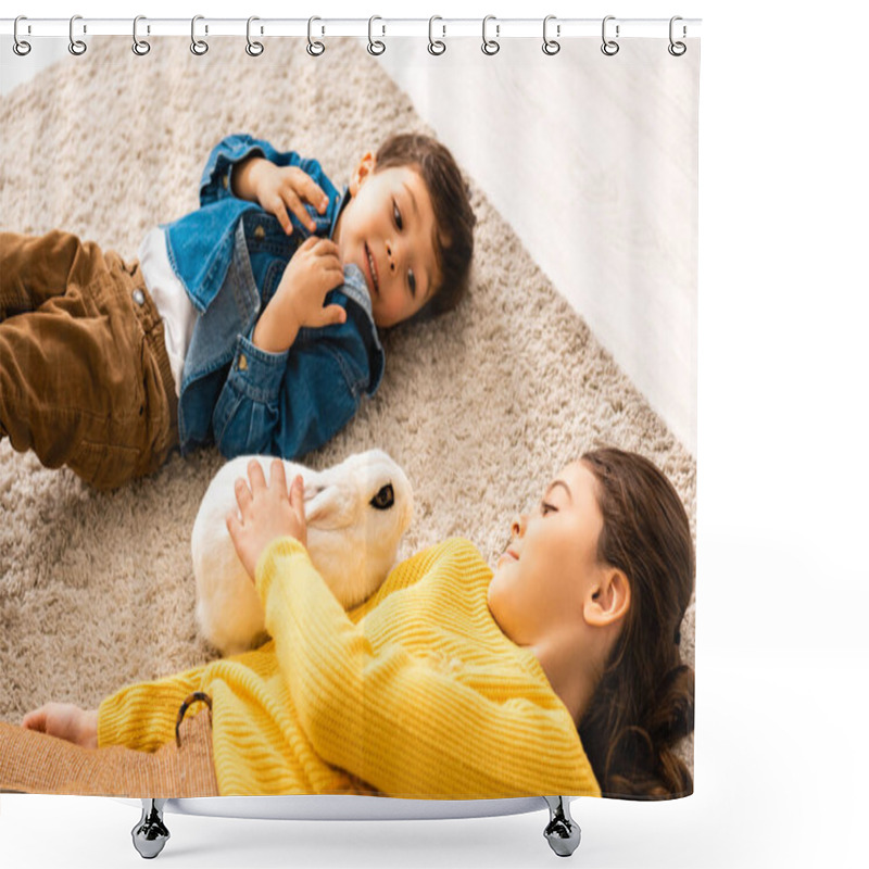 Personality  High Angle View Of Brother And Sister Lying On Floor Near White Funny Rabbit Shower Curtains