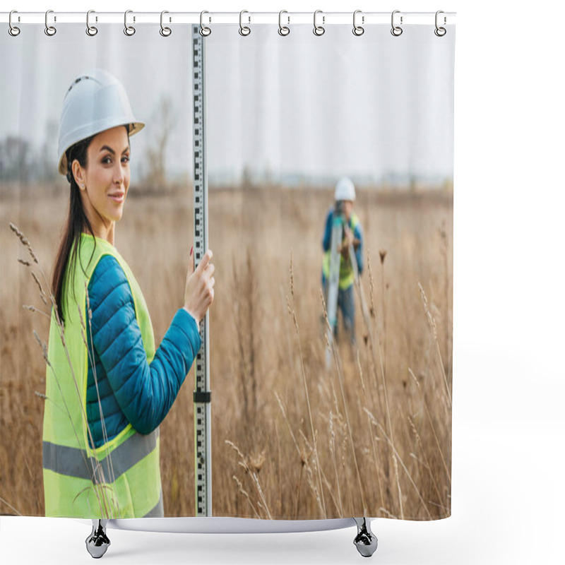 Personality  Selective Focus Of Female Surveyor With Ruler And Colleague With Digital Level In Field Shower Curtains