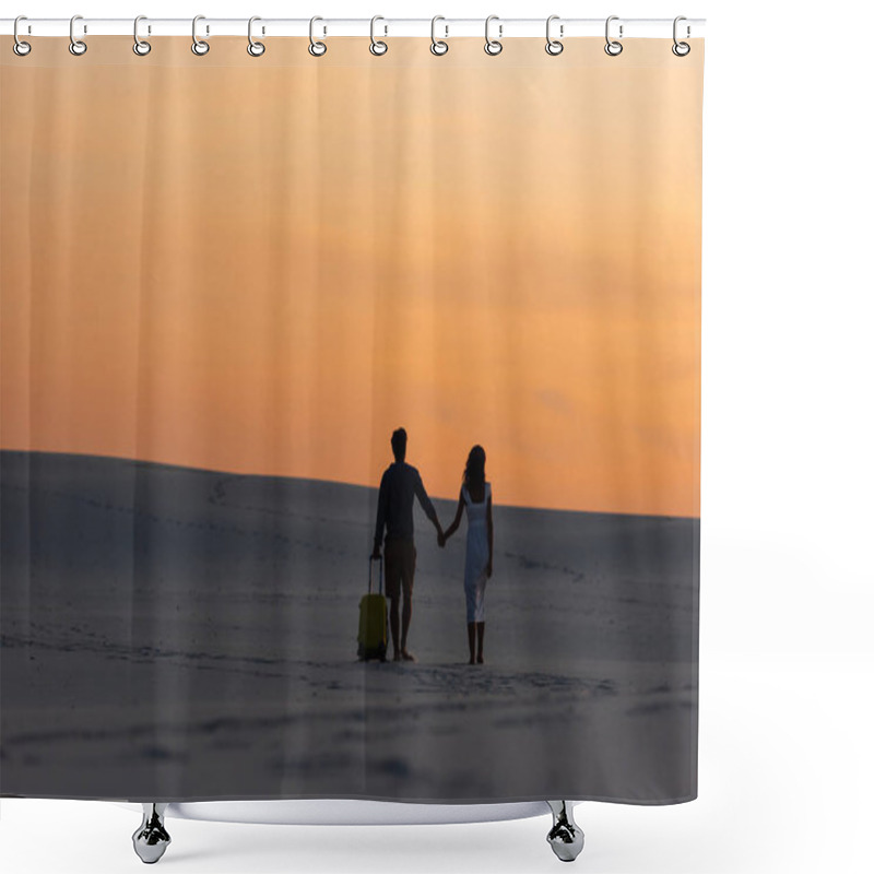 Personality  Back View Of Couple Walking On Beach While Holding Hands With Travel Bag At Sunset Shower Curtains