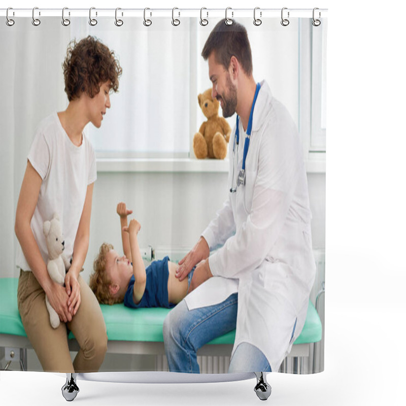 Personality  Portrait Of Smiling Doctor Examining Stomach Of Little Boy And Asking Him To Say Where It Hurts Shower Curtains