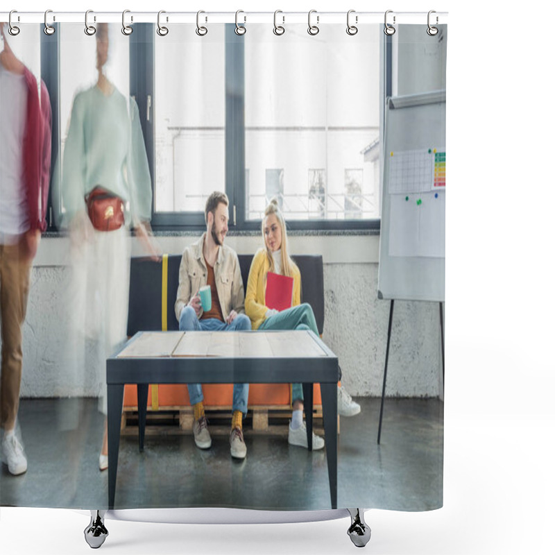 Personality  Female And Male Casual Businesspeople Sitting On Couch And Having Discussion In Loft Office With Colleagues In Motion Blur On Background  Shower Curtains