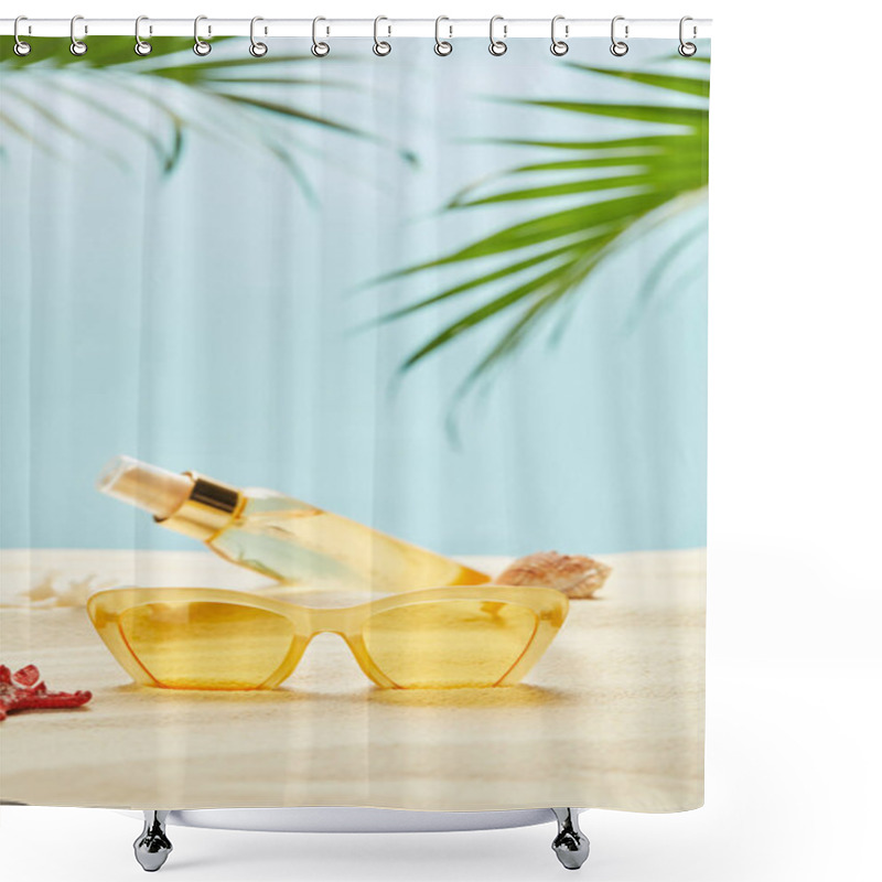 Personality  Selective Focus Of Sunglasses Near Bottle With Suntan Oil On Sand Isolated On Blue Shower Curtains