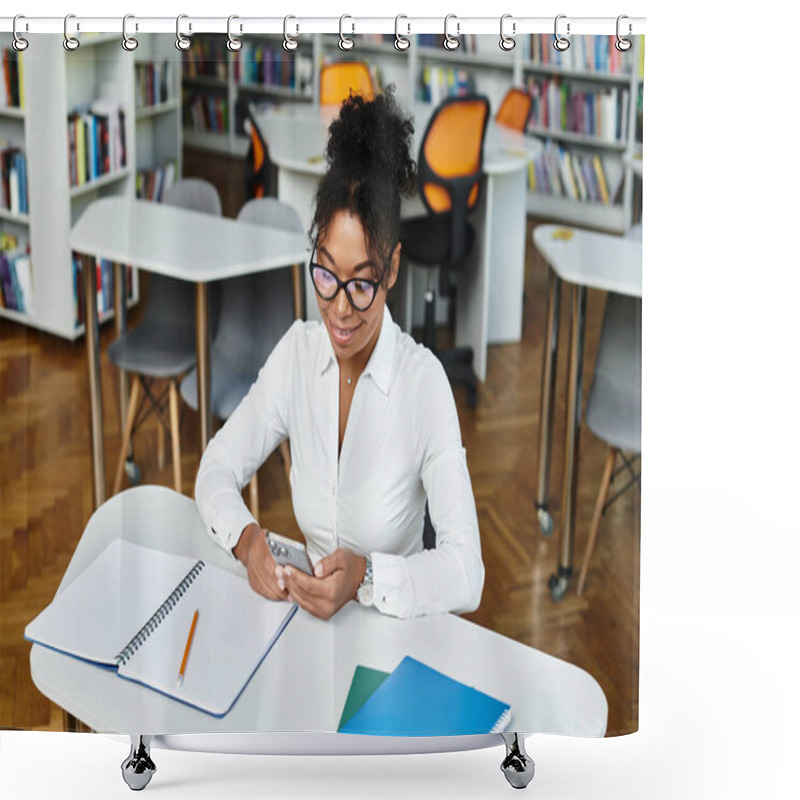 Personality  A Dedicated Teacher Uses Her Smartphone While Preparing Lessons In A Lively Library Environment. Shower Curtains