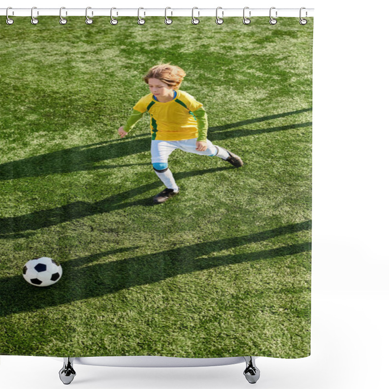 Personality  A Young Boy Energetically Kicks A Soccer Ball Across A Vibrant Green Field, Displaying Skill And Determination In His Game. Shower Curtains