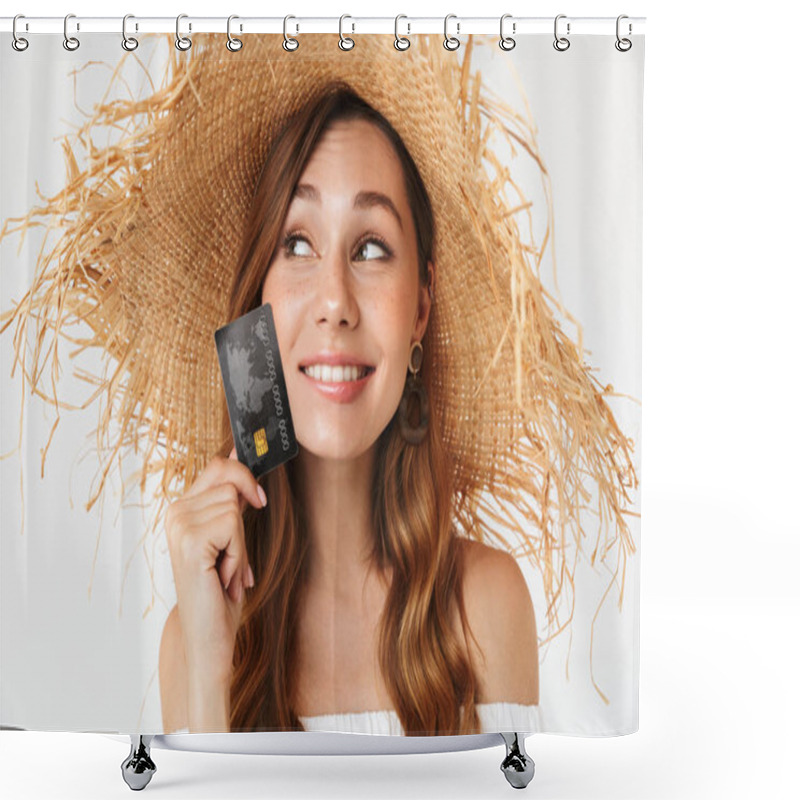 Personality  Portrait Of Happy Beautiful Woman 20s Wearing Big Straw Hat Smiling And Holding Credit Card Near Face Isolated Over White Background Shower Curtains