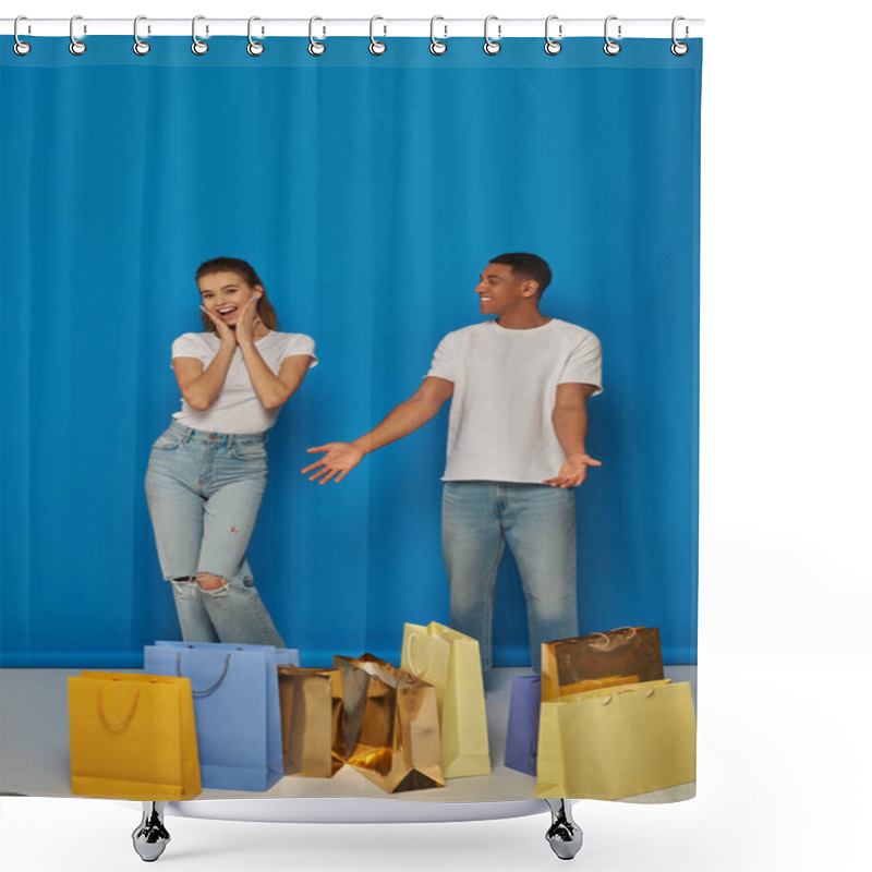 Personality  Diverse Couple, African American Man Pointing At Shopping Bags Near Excited Woman On Blue Backdrop Shower Curtains