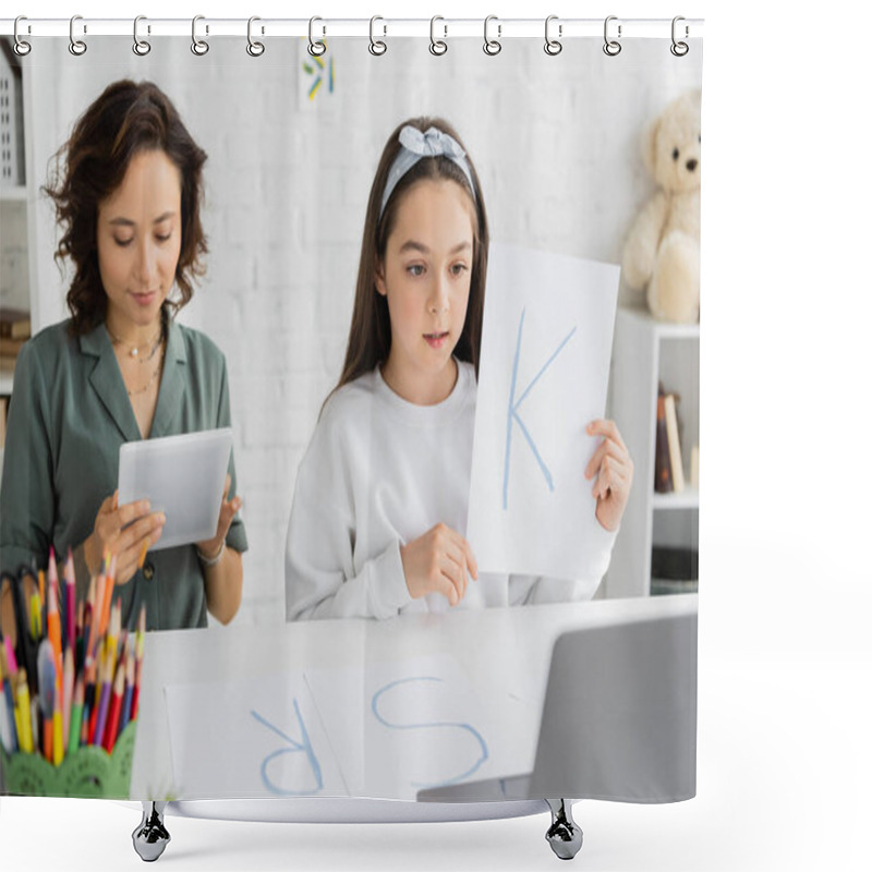 Personality  Preteen Girl Holding Paper With Letter K During Speech Therapy Online Lesson On Laptop Near Mom At Home  Shower Curtains