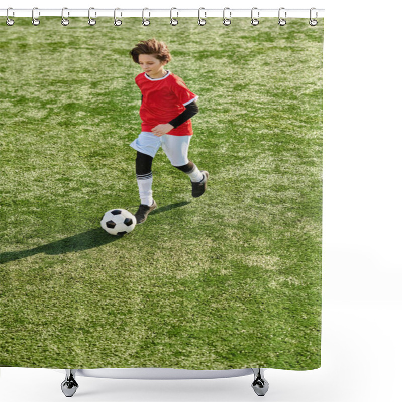 Personality  A Young Boy Kicks A Soccer Ball With Determination And Skill On A Lush Green Field, Showcasing His Passion For The Sport. Shower Curtains