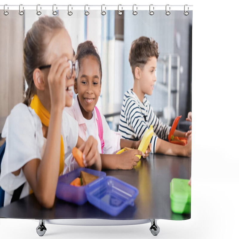 Personality  Selective Focus Of Schoolgirl Touching Eyeglasses And Holding Fresh Carrot In School Canteen Near Multicultural Friends Shower Curtains