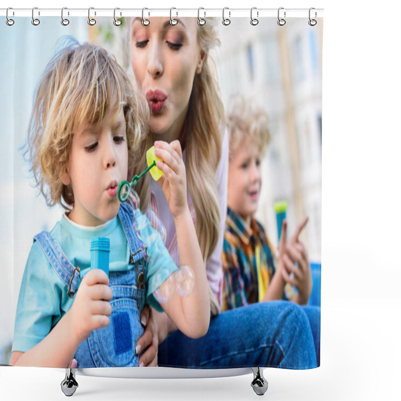 Personality  Selective Focus Of Mother And Little Son Using Bubble Blower While Other Boy Sitting Near  Shower Curtains