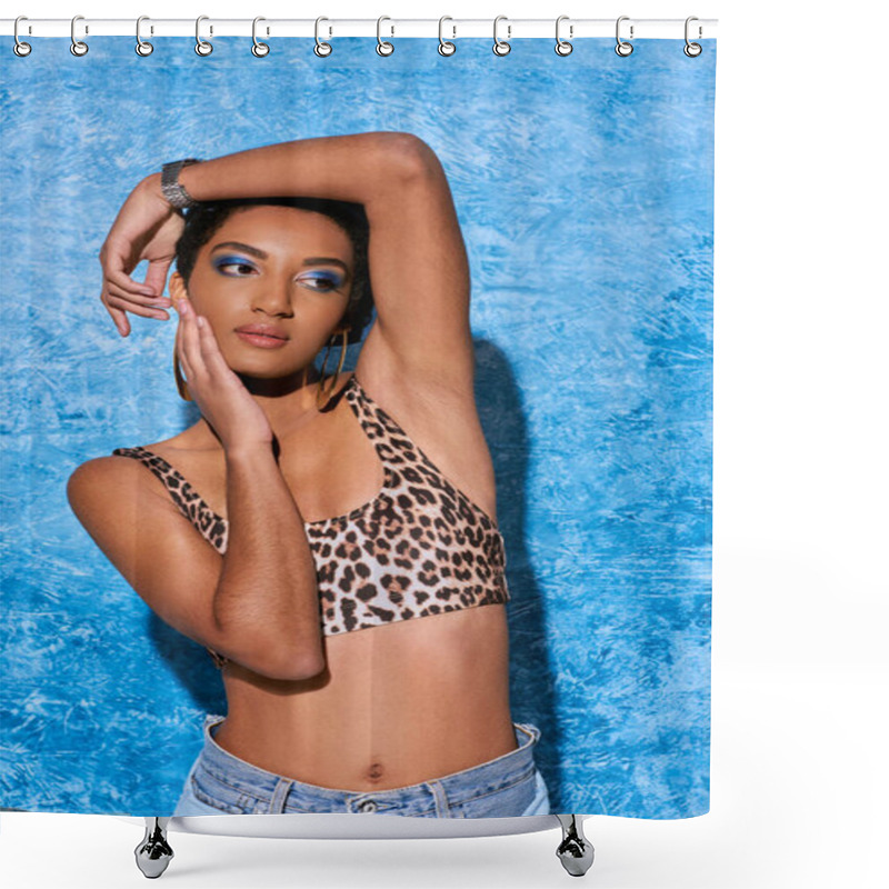 Personality  Trendy Short Haired African American Woman With Bold Makeup Posing In Top With Leopard Pattern And Touching Cheek On Blue Textured Background, Stylish Denim Attire Shower Curtains