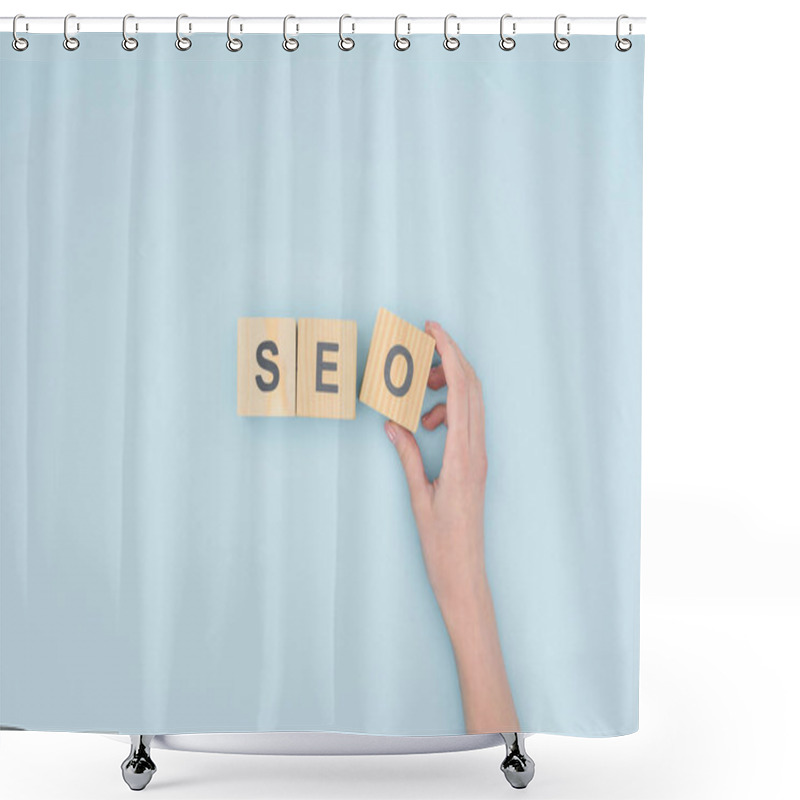 Personality  Top View Of Female Seo Manager Holding Cube With Seo Lettering On Light Blue Background  Shower Curtains