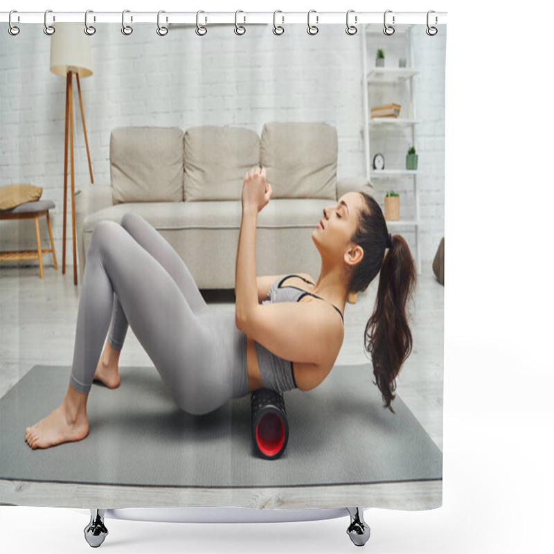 Personality  Side View Of Relaxed Young Woman In Activewear Massaging Small Of Back With Modern Roller Massager On Fitness Mat In Living Room At Home, Sense Of Tranquility And Promote Relaxation Concept Shower Curtains