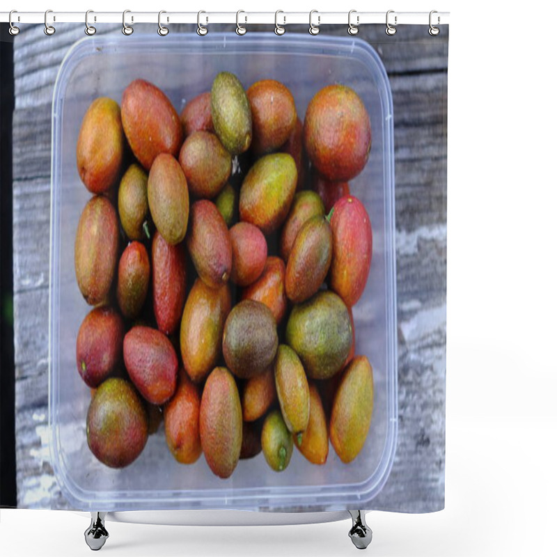 Personality  Finger Lime In A Plastic Container On A Wooden Table. Shower Curtains