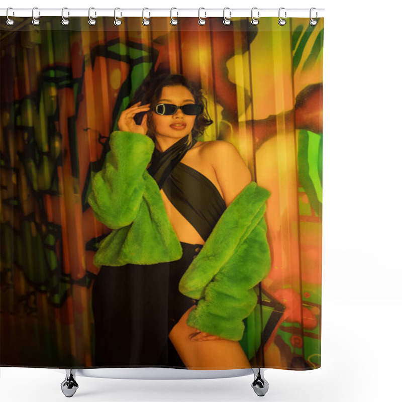 Personality  Sexy Asian Woman In Fake Fur Jacket Touching Sunglasses And Standing Near Graffiti In Night Club Shower Curtains