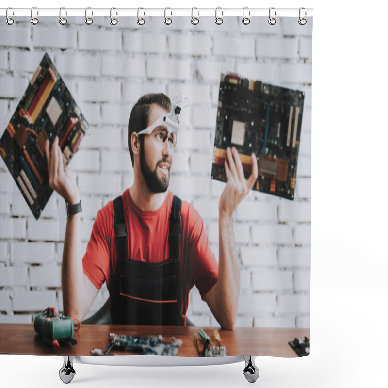 Personality  Young Man In Uniform With Broken Motherboards In Shop. Modern Workshop Concept. Manufacturing Instrument. Modern Tools Concept. Electronic Devices Concept. Mobile Device Hardware. Wooden Desk. Shower Curtains