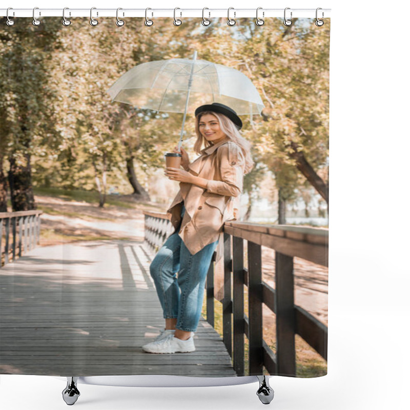 Personality  Selective Focus Of Woman In Hat Holding Umbrella And Disposable Cup While Standing On Bridge In Autumnal Park  Shower Curtains