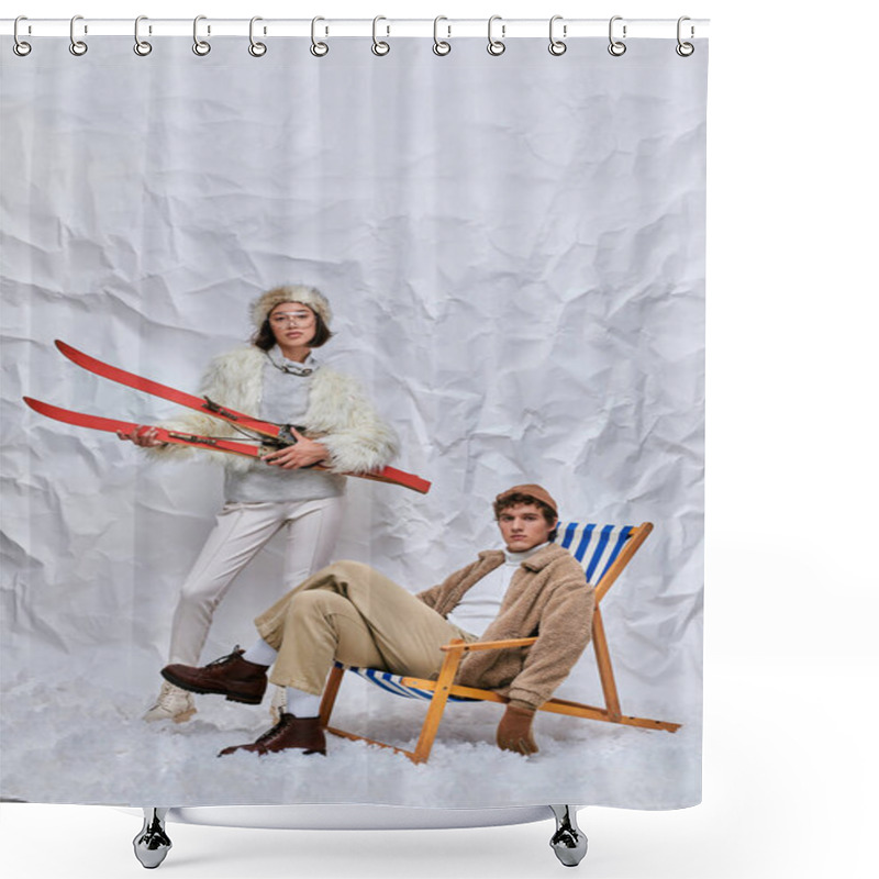 Personality  Asian Woman With Skis And Stylish Man In Deck Chair Looking At Camera In Snowy Studio, Winter Style Shower Curtains