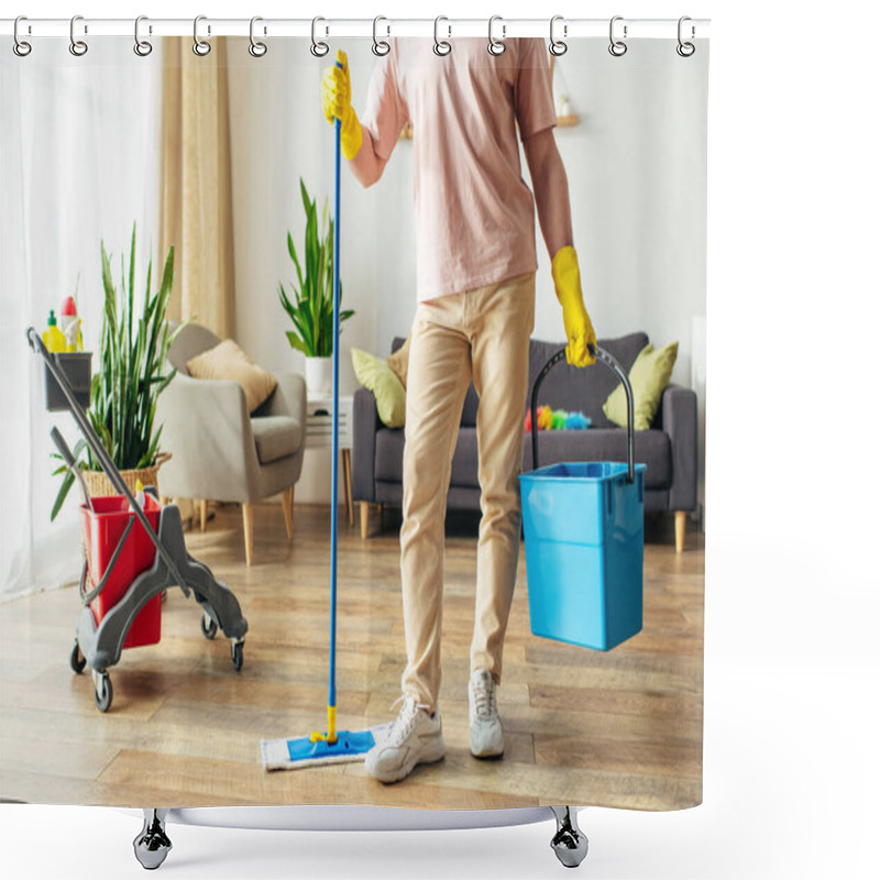 Personality  A Handsome Man In Cozy Homewear Meticulously Mopping Floors With A Bucket Of Cleaning Supplies. Shower Curtains