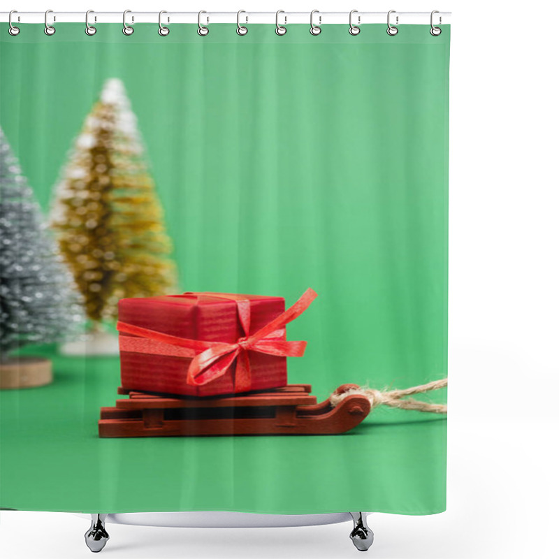 Personality  Selective Focus Of Silver And Golden Decorative Christmas Trees Near Sled With Gift Box On Green Shower Curtains