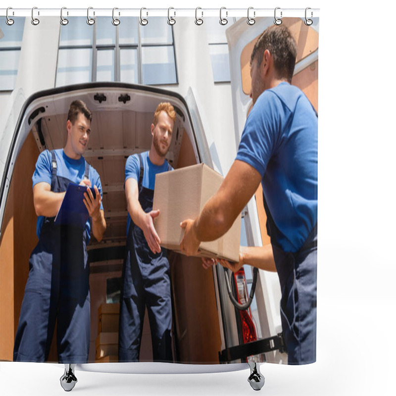 Personality  Low Angle View Of Movers Holding Cardboard Box Near Colleague Writing On Clipboard  Shower Curtains