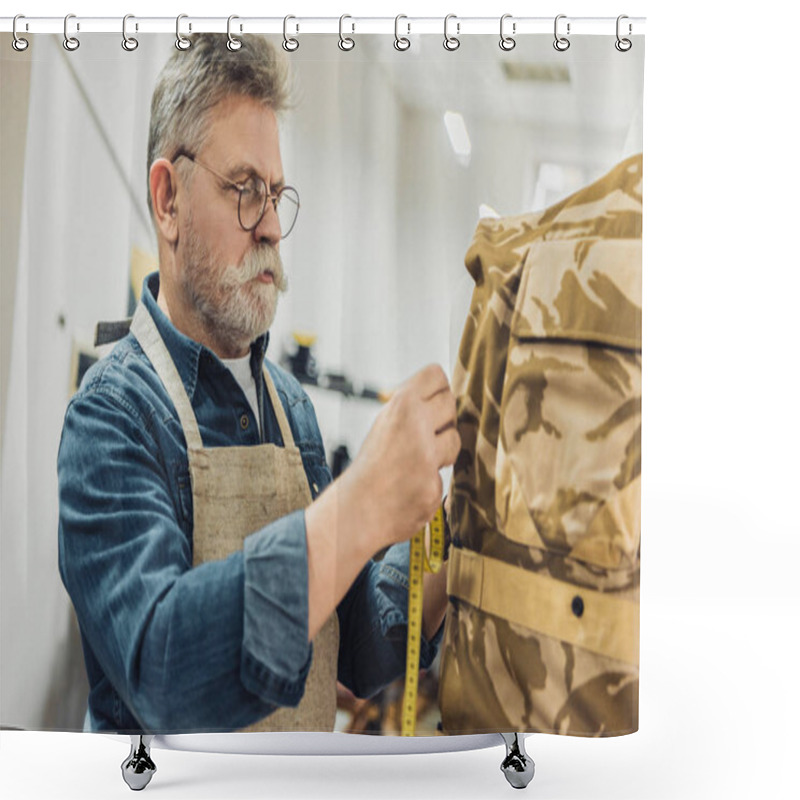 Personality  Selective Focus Of Middle Aged Male Tailor Making Measurements On Military Vest At Workshop Shower Curtains