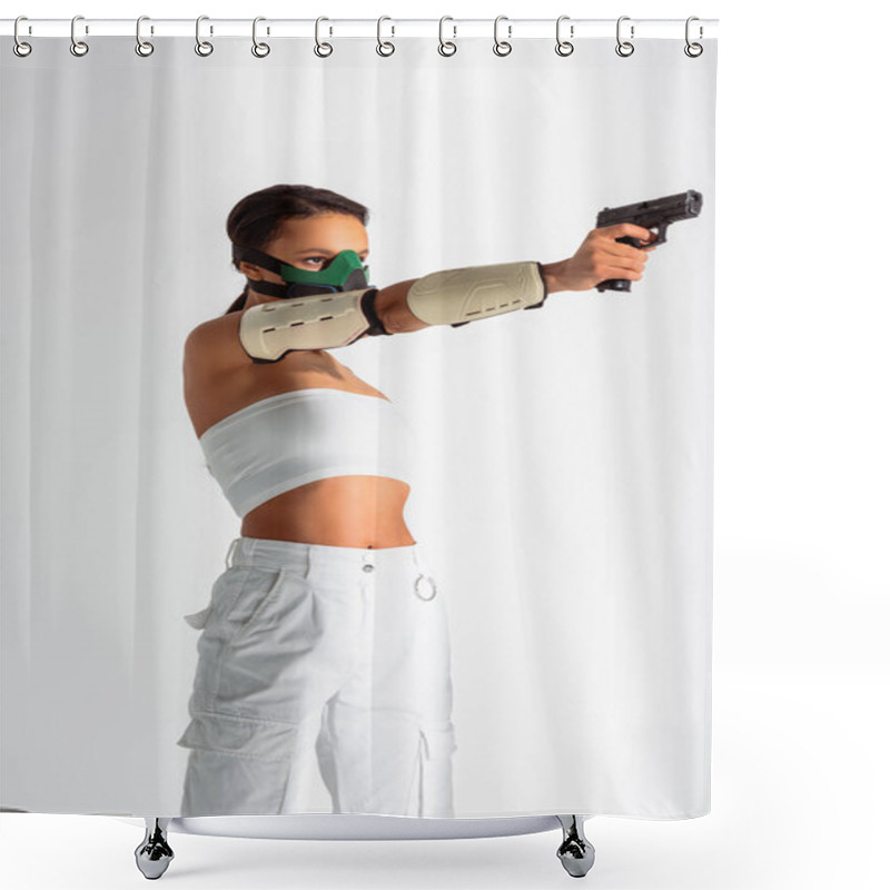 Personality  Futuristic African American Woman In Safety Mask Aiming Gun On White Background Shower Curtains