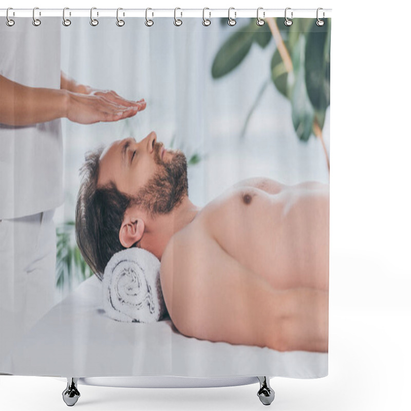 Personality  Cropped Shot Of Bearded Man With Closed Eyes Lying And Receiving Reiki Therapy Above Head Shower Curtains