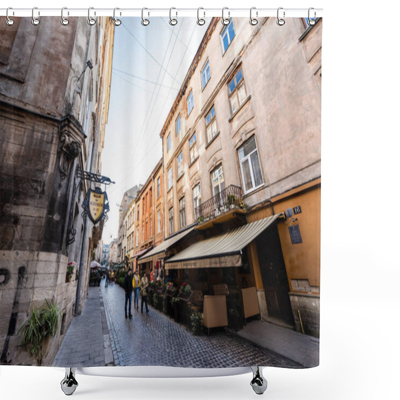 Personality  LVIV, UKRAINE - OCTOBER 23, 2019: People Walking Along Street Cafe And Signboard With Cyrillic Lettering On Old House  Shower Curtains