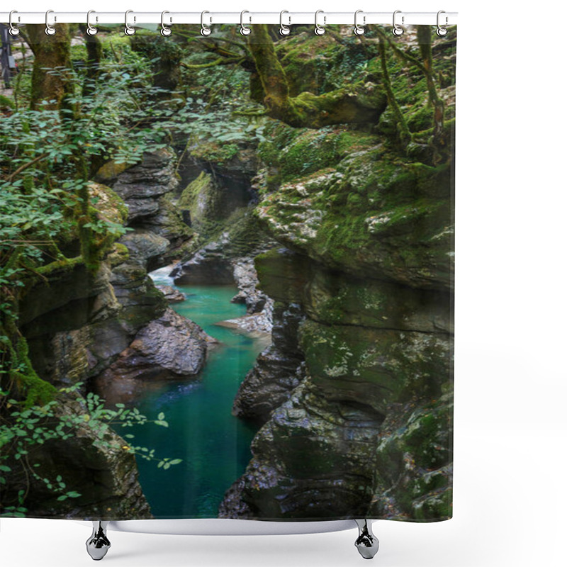 Personality  Martvili Canyon In Georgia - Stone Gorge, The Blue Water At The Bottom. Tree Trunks And Stones Are Covered With Green Moss, The Crevice Is Illuminated By Light Shower Curtains