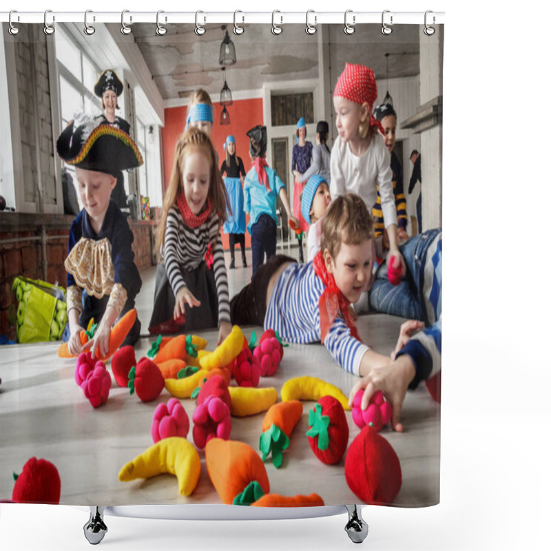 Personality  RUSSIA, YAROSLAVL - 17 FEB. 2018: Happy Group Of Children At A Birthday Celebration Dressed In The Style Of Pirates With An Animator, Contests And Bubbles Play Games In A Large Room With Loft Style Shower Curtains