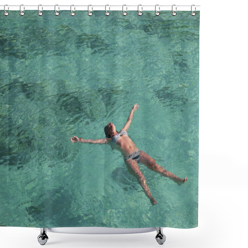 Personality  A Young Girl Lies On Her Back, Back On The Calm Surface Of The Tranquil Turquoise Ocean. Shower Curtains