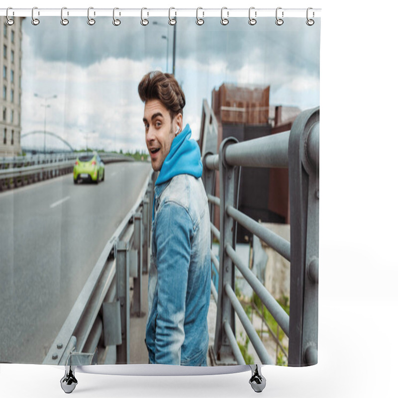 Personality  Side View Of Positive Man In Earphones Looking At Camera Near Road On Urban Street  Shower Curtains